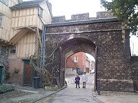 15th Century Prior's Gate. Main entrance to The Close. Plain four-centred arch with original traceried doors. Coat of arms aver arch. Castellated parapet.     15th Century Porter's Lodge. Similar to Cheyney Court and forming a 2-storey projecting gabled part of the Cheyney Court block.