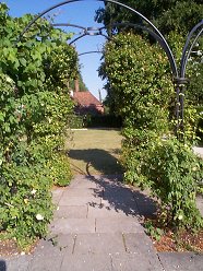 View through the Arbour to the Presbytery Lawn