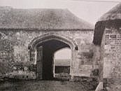 Gateway - 15th Century Hyde Abbey. Flint with stone dressings. Tiled roof. Large 4-centred carriage arch and smaller one for pedestrians. Open braced, Queenpost roof.   S.A.M. No. 97  SU 481 301