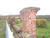 The worst section of damaged parapet, on the North West side