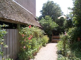 An Oak shingle roof and a secluded seat