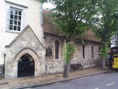 13 th Century - St. John's House and Chapel of St. John's Hospital. Chapel and lower part of St. John's House13th Century fIint and stone. Ground floor, the original hall of the hospital, has a 13th Century lancet window. First and upper floors 18th Century. Stuccoed brick with stone dressings, and stone cornice above first floor window. Hipped old tile roof. Ground floor arched window. The Chapel has six lancet windows. Cornice between floors. Parapet, and very steep pitch roof.    SU 484 293 