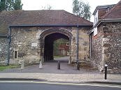 Gateway - 15th Century Hyde Abbey. Flint with stone dressings. Tiled roof. Large 4-centred carriage arch and smaller one for pedestrians. Open braced, Queenpost roof.   S.A.M. No. 97  SU 481 301