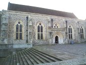 Great Hall. 13th Century Winchester Castle. Built 1232-1240, by Henry III. Flint with stone dressings and tall 2-light windows with early plate tracery. 5-bay arcade with tall Purbeck shafts. Entrance altered 19th Century to centre of one side, porch added. Roof renewed 1873. The Mediaeval Round Table is housed here.  S.A.M. No. 95     SU 477 294