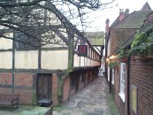 The Royal Oak Passage. Red brick with old tile roof. 2 storeys. Early 19th century appearance, but basically older.   SU 480 295