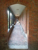 The covered walkway from the tower/gateway