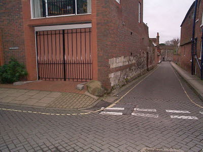 On the corner of Minster Lane and St Thomas Street. 